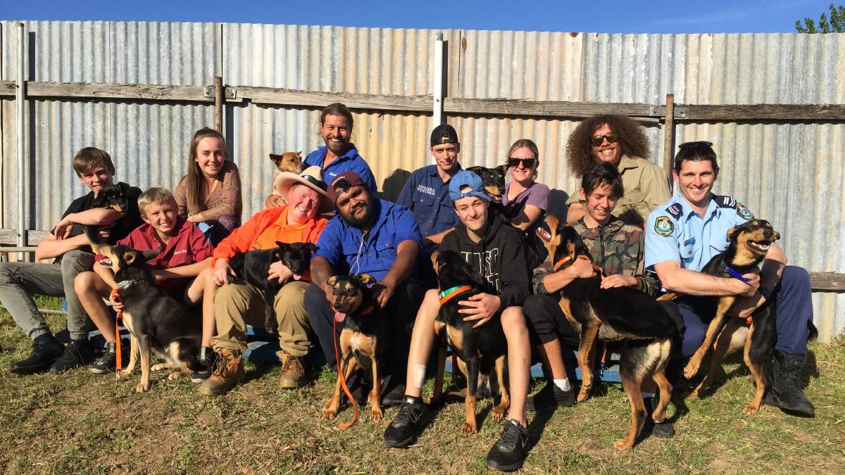 (L-R) Rory and Bryson (participants), Eddi and Farmer Mandy (volunteers), dog trainer Farmer Dave, Ducky (youth worker), Farmer Phill (farm hand), Jono (participant), Pieta (volunteer), Ajay (participant), Zac (youth worker) and Senior Constable Jon Cole. 